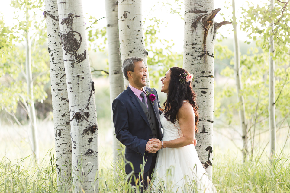 bride groom laughing at wedding in aspen colorado