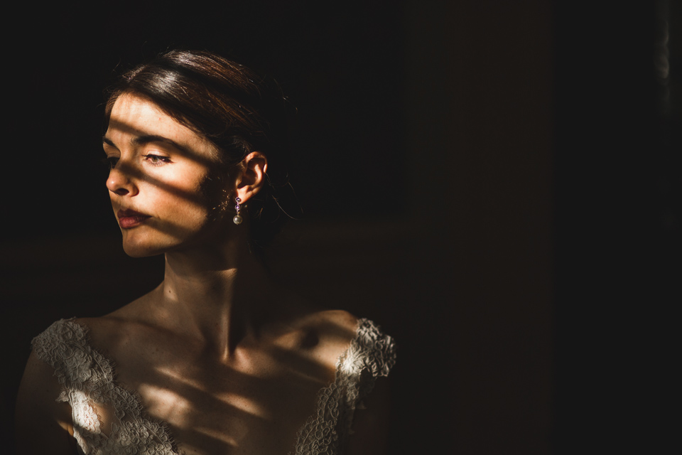 bride sitting in sunlight denver colorado wedding